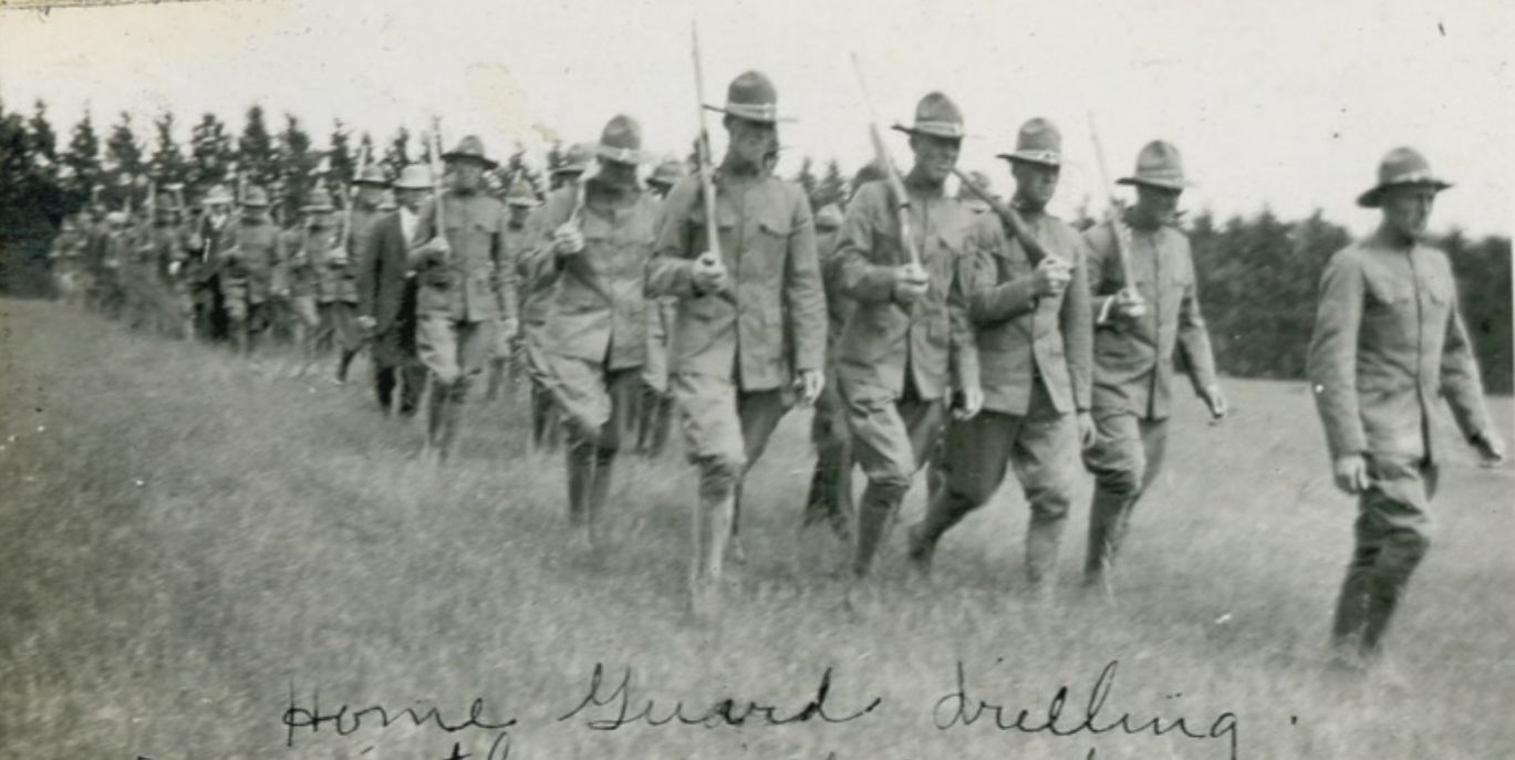 Photo - Home Guard Marching in the cemetery.